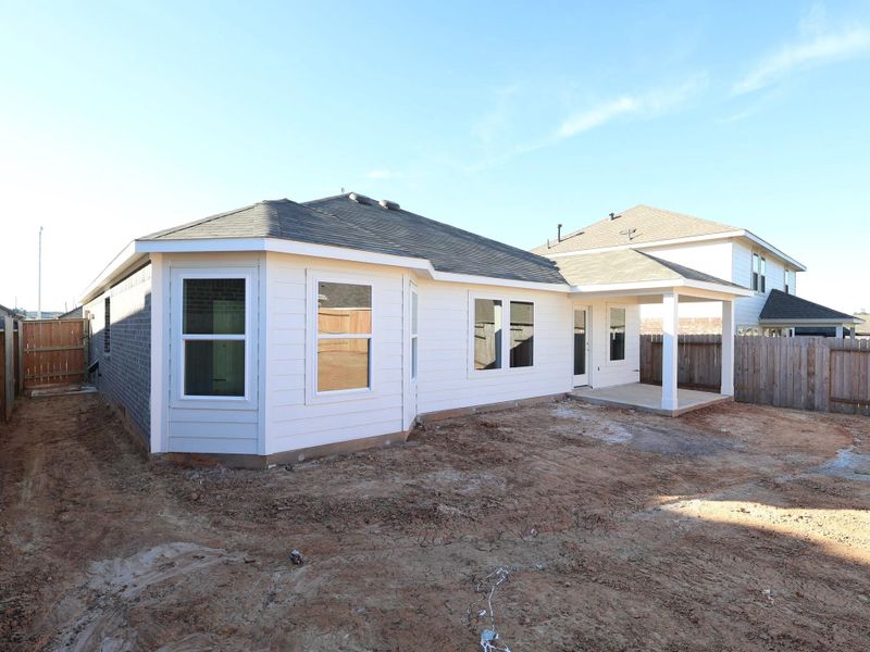 Exterior details and patio area of a home in Magnolia Ridge, Magnolia (Image 3). Exterior details and patio area of a home in Magnolia Ridge, Magnolia (Image 3).