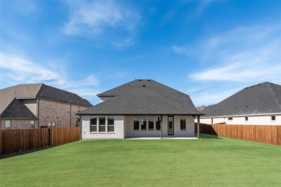Exterior details and patio area of a home in Arbors at Legacy Hills, Celina (Image 3).
