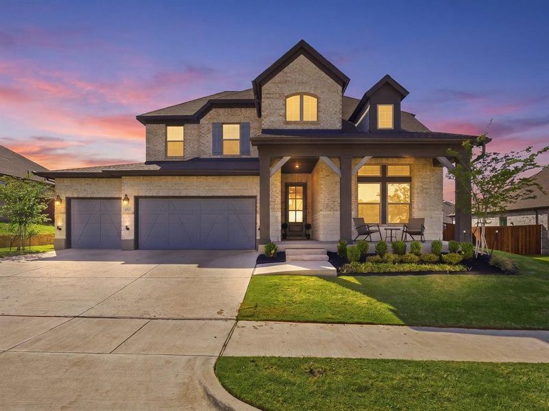 Front exterior of a new home in South Pointe  Village Series, Mansfield, TX, highlighting curb appeal (Image 22).