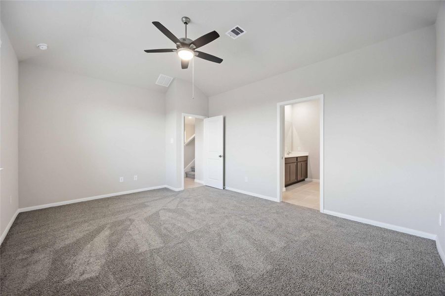 Spacious, unfurnished interior of a new home in Sunterra, Katy (Image 30).