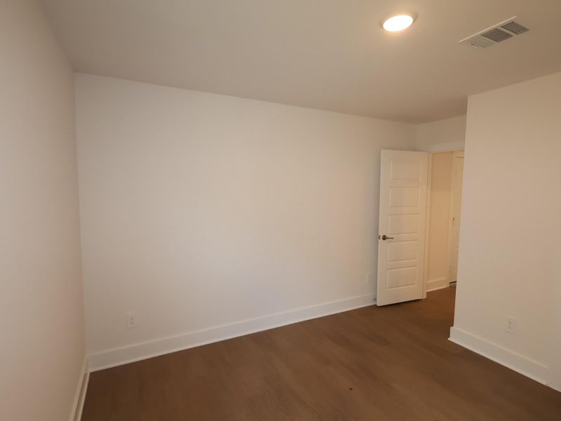 Spacious, unfurnished interior of a new home in Lone Star Landing, Montgomery (Image 19).