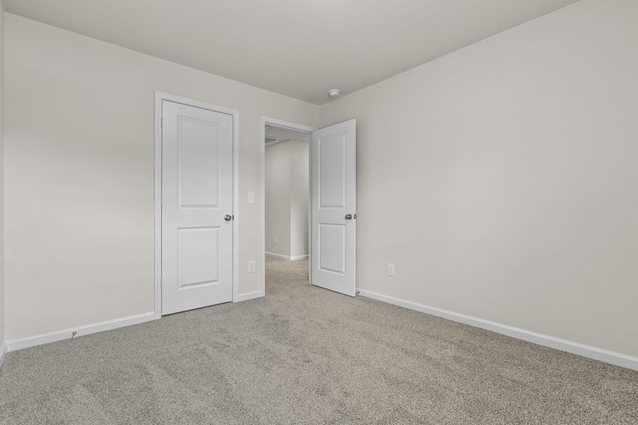 Representative unfurnished interior of a home built from the Cedar A by McGuinn Homes in Forts Ridge, Pelion (Image 21).