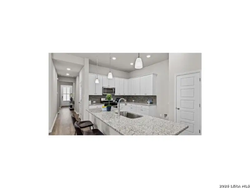 Furnished interior view inside a new home in Bricewood, San Antonio (Image 4).