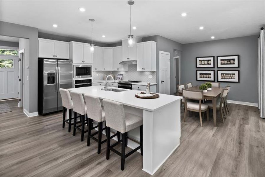 Representative furnished interior of a home built from the Roanoke by Ryan Homes in Backwoods Farms, Moyock (Image 1). Representative furnished interior of a home built from the Roanoke by Ryan Homes in Backwoods Farms, Moyock (Image 1).