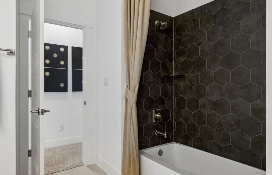 Representative furnished interior of a home built from the Iredell by Pulte Homes in Katy Court, Katy (Image 37).