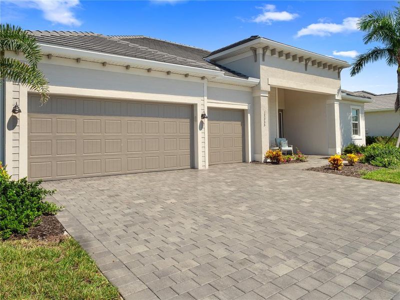 Front exterior of a new home in , Venice, FL, highlighting curb appeal (Image 19). Front exterior of a new home in , Venice, FL, highlighting curb appeal (Image 19).