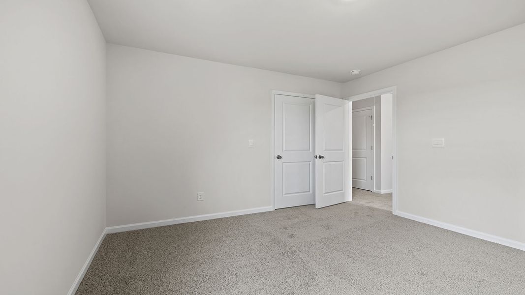 Spacious, unfurnished interior of a new home in Village Grove, Greenville (Image 20).