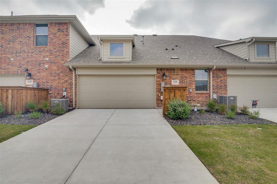 Front exterior of a new home in , Wylie, TX, highlighting curb appeal (Image 2). Front exterior of a new home in , Wylie, TX, highlighting curb appeal (Image 2).