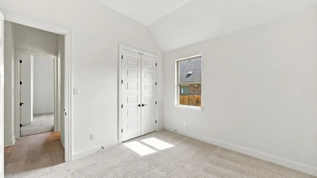 Furnished interior view inside a new home in Oaks at San Gabriel, Georgetown (Image 10).