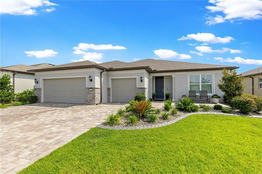 Front exterior of a new home in , Ocala, FL, highlighting curb appeal (Image 2). Front exterior of a new home in , Ocala, FL, highlighting curb appeal (Image 2).