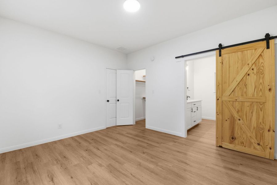 Barn-door entry adding character and style