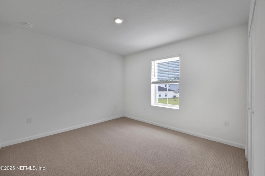 Spacious, unfurnished interior of a new home in Cordova Palms, St. Augustine (Image 22).