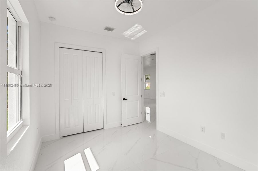 Spacious, unfurnished interior of a new home in , Lehigh Acres (Image 36).
