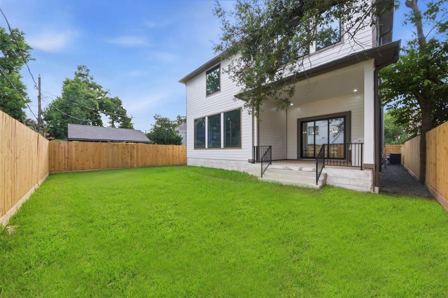 Exterior details and patio area of a home in , Houston (Image 4).