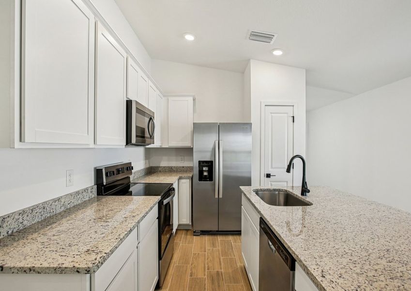 Each kitchen includes stainless-steel appliances Each kitchen includes stainless-steel appliances
