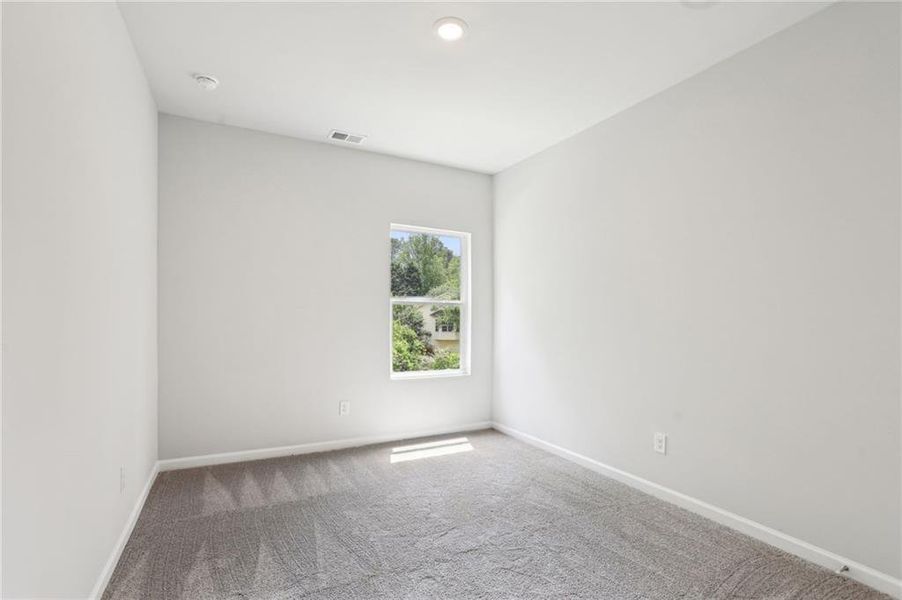 Spacious, unfurnished interior of a new home in The Hills at Cedar Creek, Winder (Image 29).