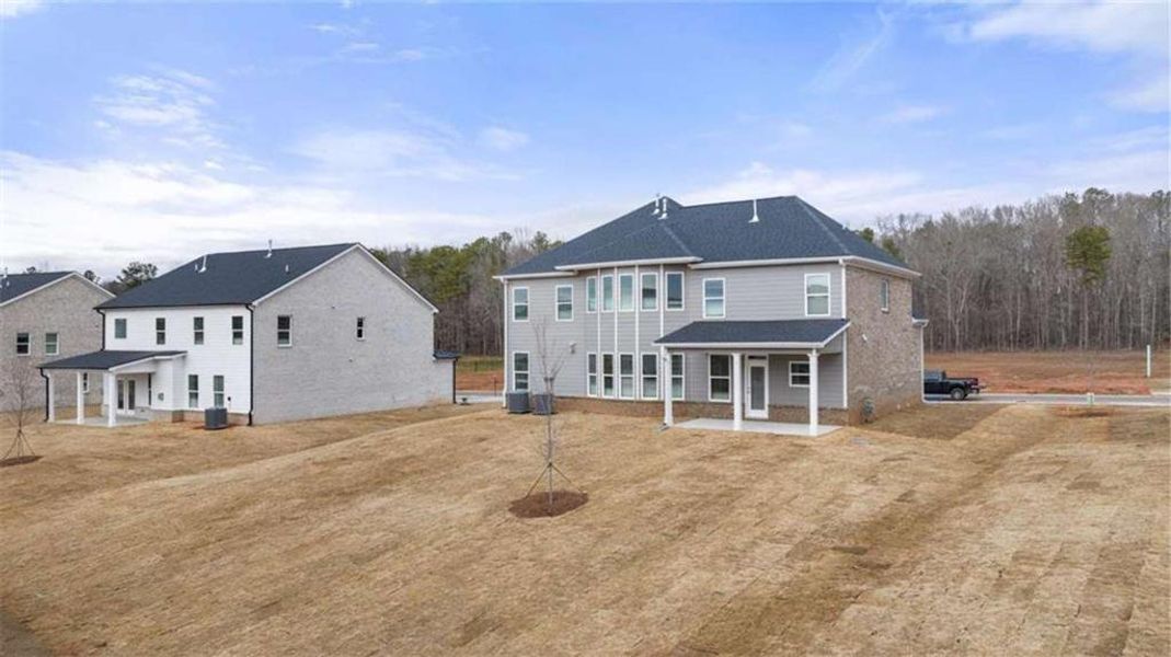Exterior details and patio area of a home in The Gates at Pates Creek, Hampton (Image 25).