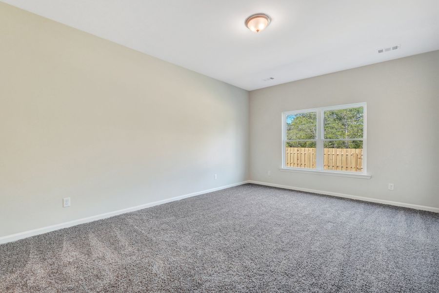 Spacious, unfurnished interior of a new home in Heritage at New Riverside, Bluffton (Image 27).