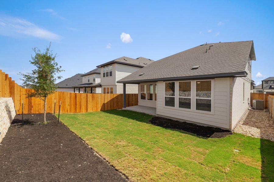 Exterior details and patio area of a home in Heritage, Dripping Springs (Image 31).