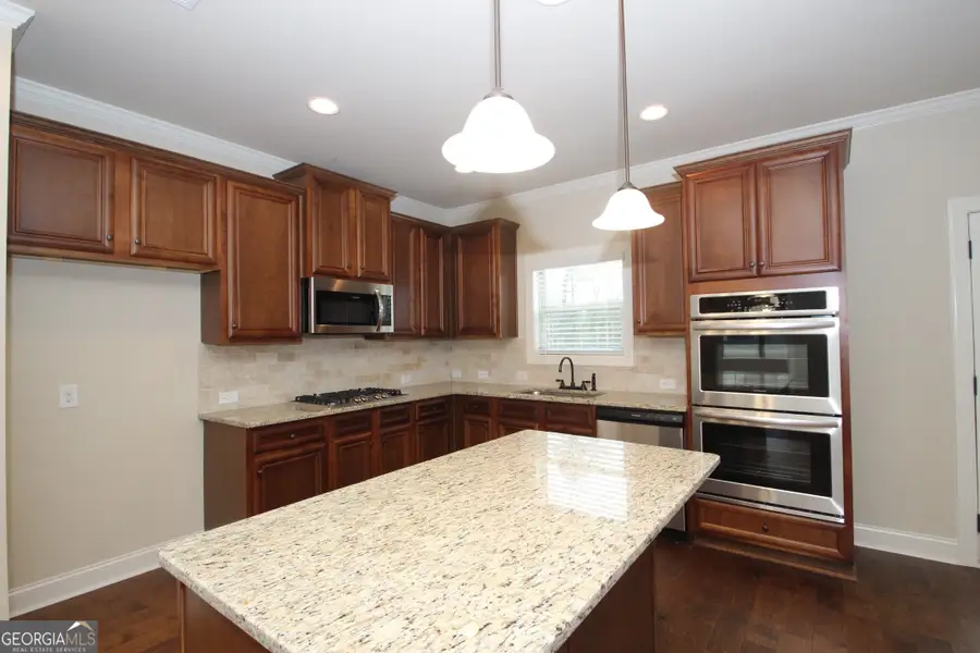 Furnished interior in a model home at Greystone in Forsyth (Image 5).