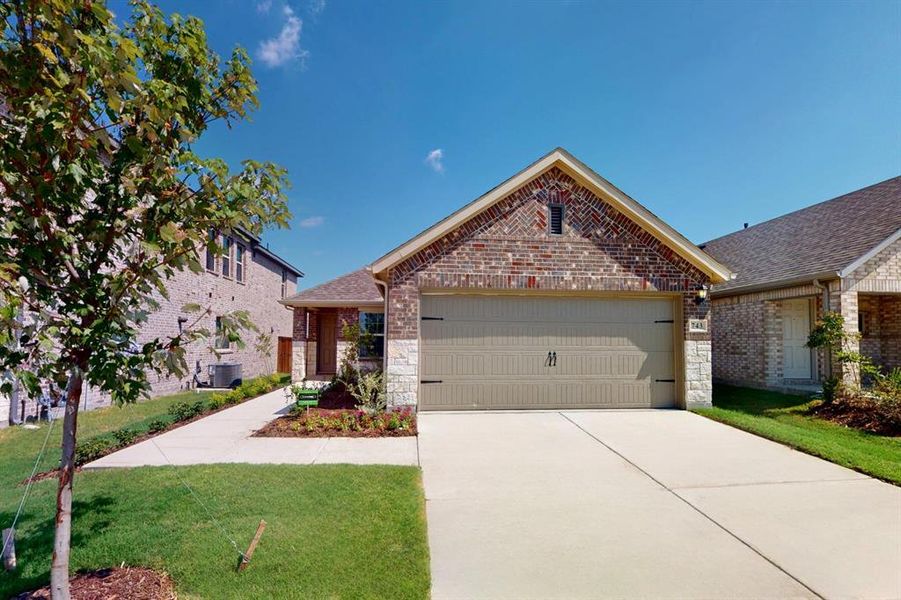 Front exterior of a new home in Elevon, Lavon, TX, highlighting curb appeal (Image 16).