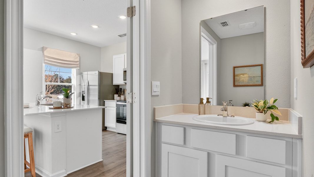 Representative furnished interior of a home built from the Baxter by D.R. Horton in Liberty Cove, Yulee (Image 12).