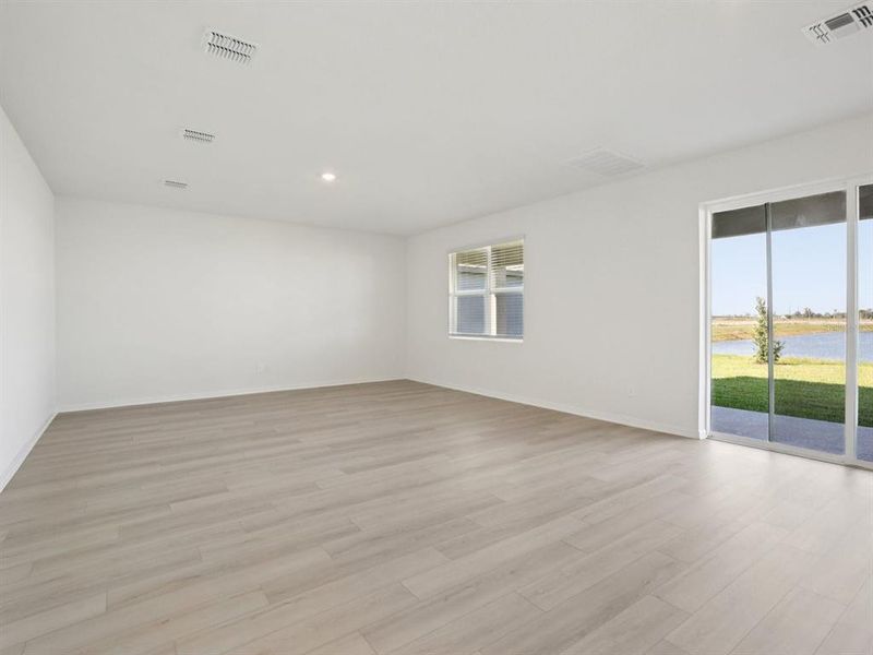 Spacious, unfurnished interior of a new home in Coasterra - Reserve Series, Palmetto (Image 19).