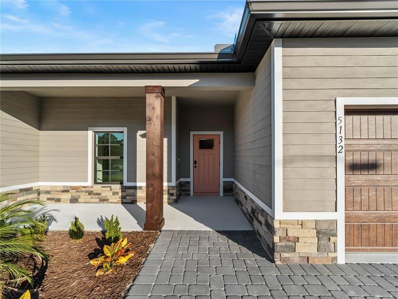 Exterior details and patio area of a home in , North Port (Image 32).