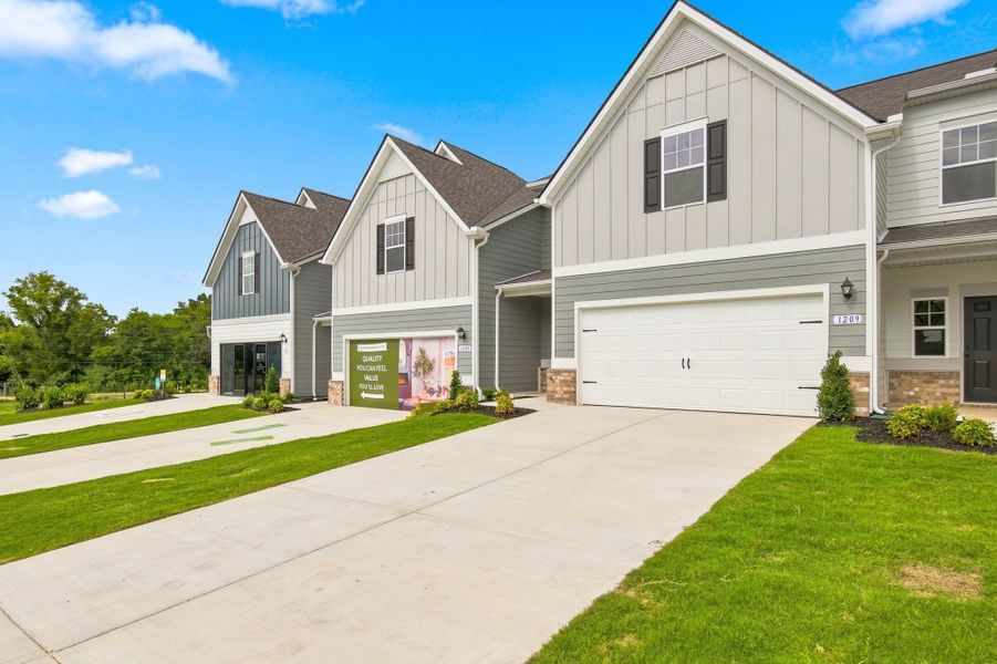 Front exterior of a new home in Spring Branch, Smyrna, TN, highlighting curb appeal (Image 23).