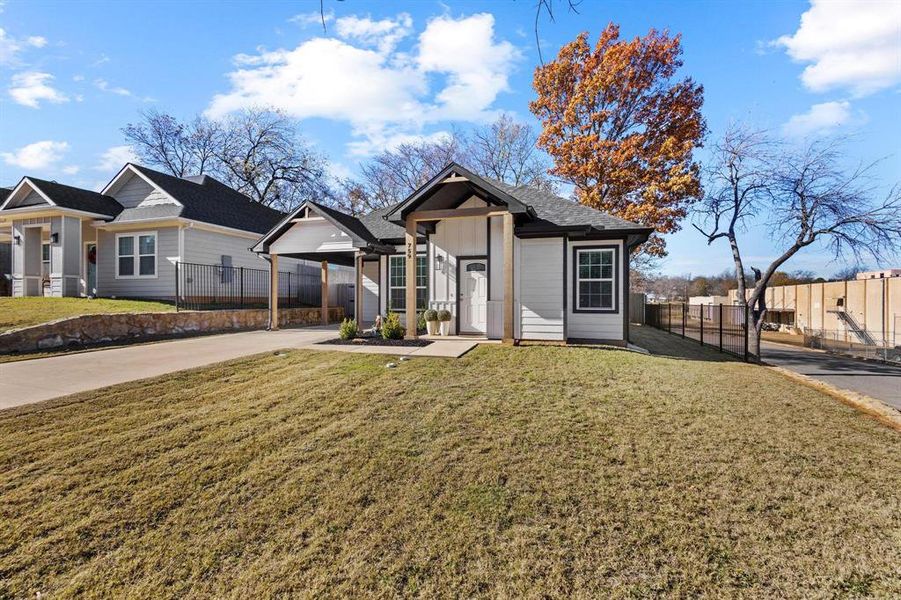 Front exterior of a new home in , Denison, TX, highlighting curb appeal (Image 1). Front exterior of a new home in , Denison, TX, highlighting curb appeal (Image 1).