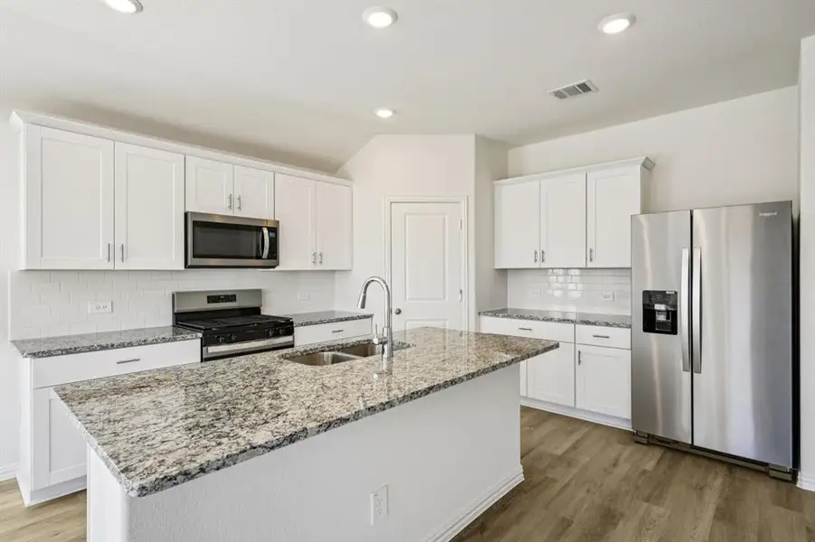 Photo is not of the actual home, but is an inspirational photo of builder’s model home and may depict options, furnishings, and/or decorator features that are not included.