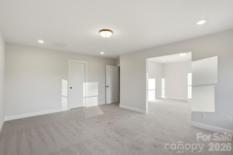 Primary Bedroom and Sitting Room