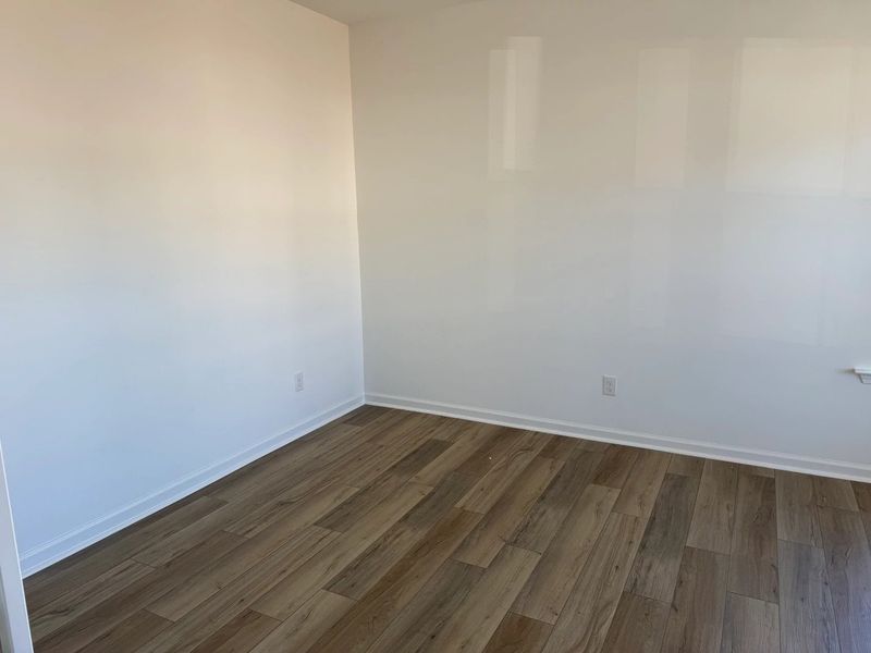 Study featuring the AW Collection® Rosemary - A quiet retreat with deep hues and light wood.