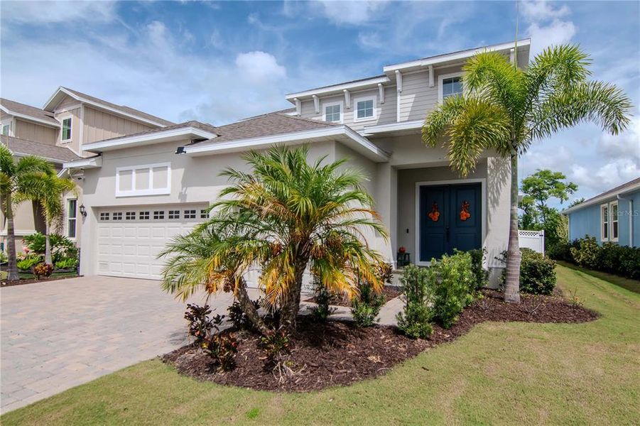 Front exterior of a new home in , Apollo Beach, FL, highlighting curb appeal (Image 24). Front exterior of a new home in , Apollo Beach, FL, highlighting curb appeal (Image 24).