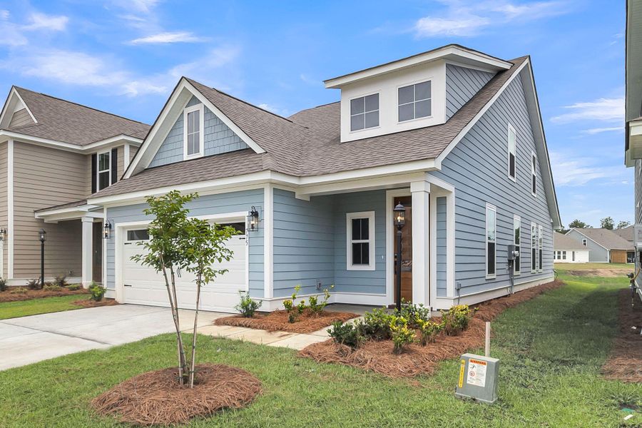 Front exterior of a new home in High Point at Foxbank, Moncks Corner, SC, highlighting curb appeal (Image 33).
