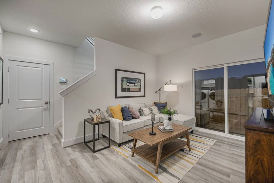 Representative furnished interior of a home built from the Calypso by Chesmar Homes in Prominence Urban, San Antonio (Image 14).