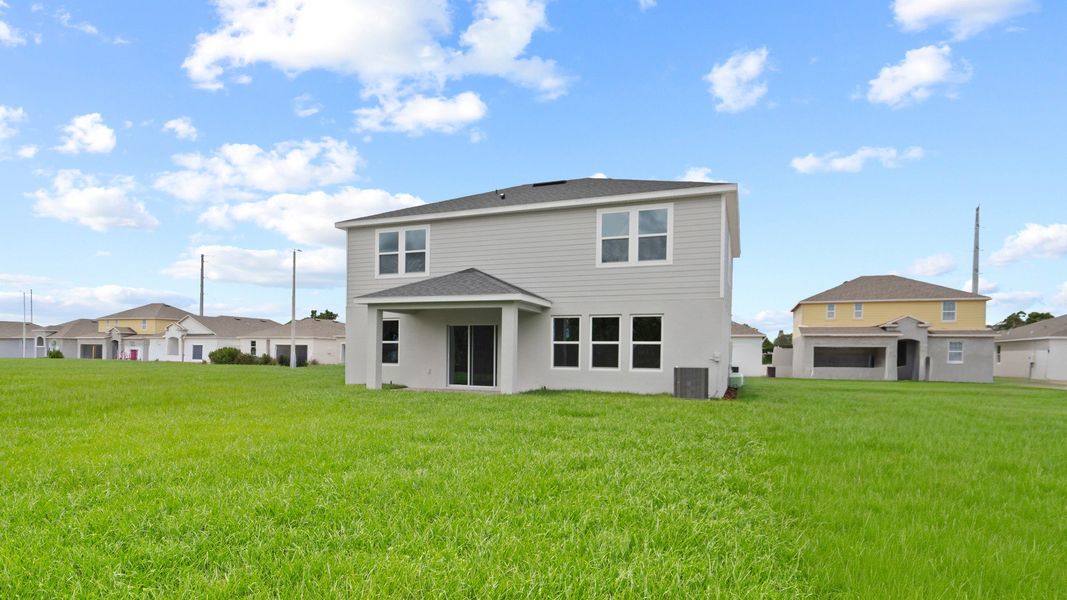 Highbourne Back Exterior by DRB Homes in Willowbrook North located on Lake Fannie in Winter Haven, FL. Highbourne Back Exterior by DRB Homes in Willowbrook North located on Lake Fannie in Winter Haven, FL.