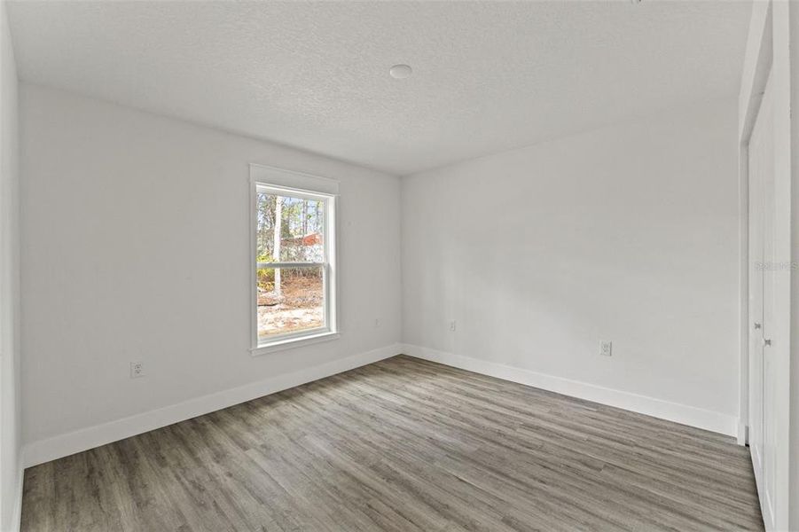 Spacious, unfurnished interior of a new home in , Weeki Wachee (Image 24).