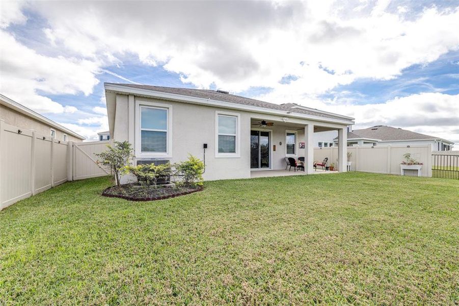 Exterior details and patio area of a home in Farm at Varrea, Plant City (Image 27).