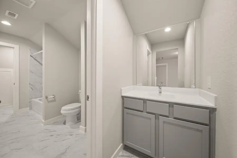 Furnished interior view inside a new home in Barton Creek Ranch, Conroe (Image 5).