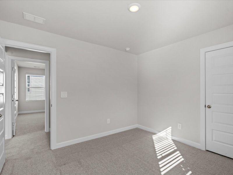 Spacious, unfurnished interior of a new home in The Farm at Wells Creek - Heritage Collection, Gray Court (Image 17).