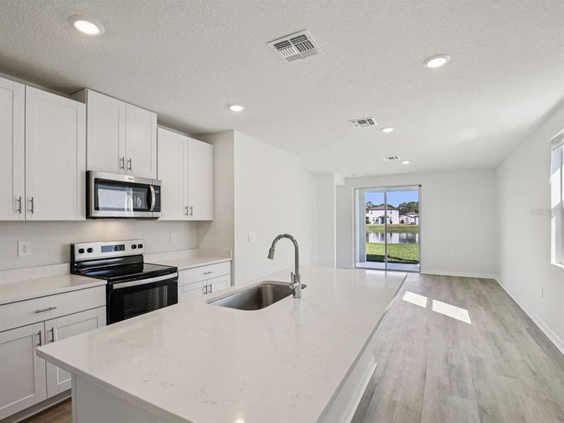 Furnished interior view inside a new home in Leyland Preserve - Premier Series, Brooksville (Image 8). Furnished interior view inside a new home in Leyland Preserve - Premier Series, Brooksville (Image 8).