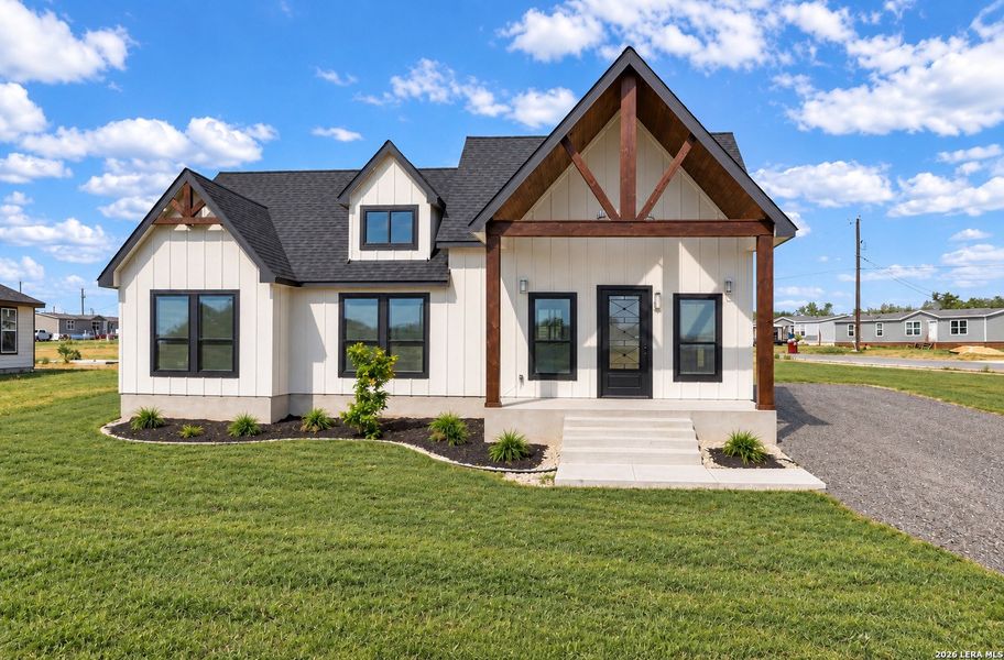 Front exterior of a new home in , Atascosa, TX, highlighting curb appeal (Image 23). Front exterior of a new home in , Atascosa, TX, highlighting curb appeal (Image 23).