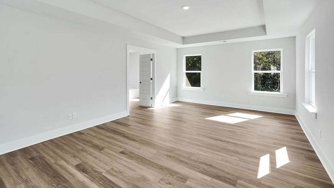 Spacious, unfurnished interior of a new home in The Haven at Indigo Preserve, Leland (Image 25).