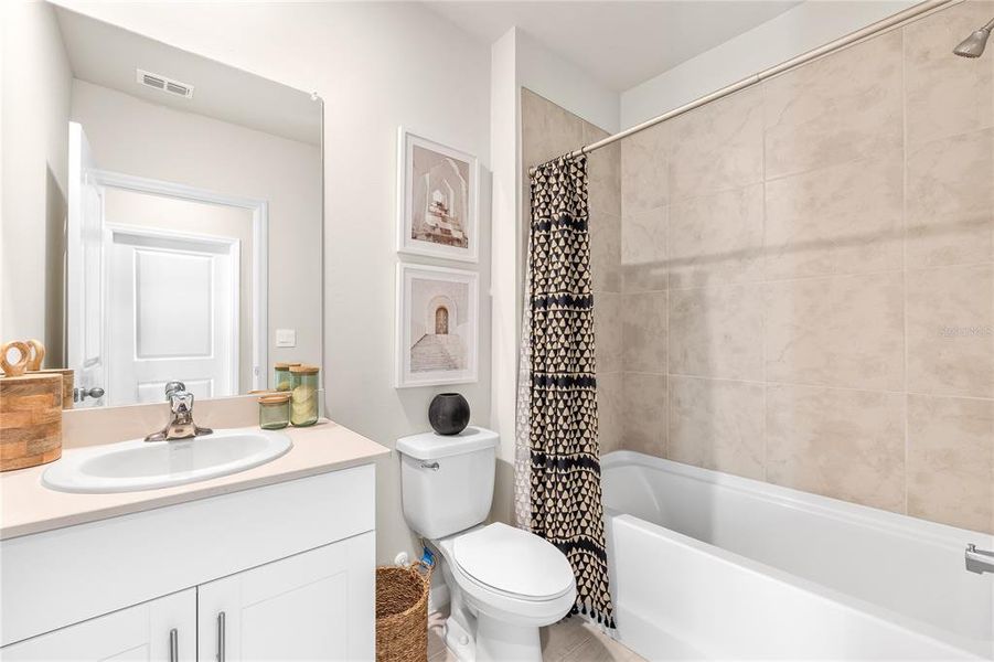 Furnished interior view inside a new home in Central Parc, North Port (Image 9). Furnished interior view inside a new home in Central Parc, North Port (Image 9).