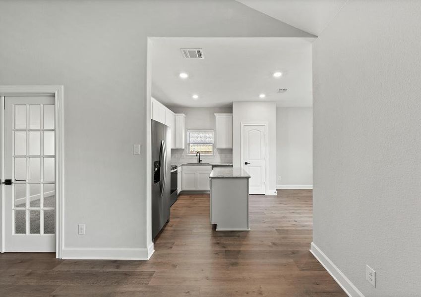 The kitchen of the Sabine floor plan sits right off of the family room.