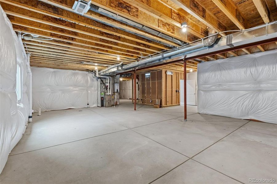 In-progress construction of a new home in The Cottages Collection at Ridgeline Vista, Brighton, CO (Image 23).