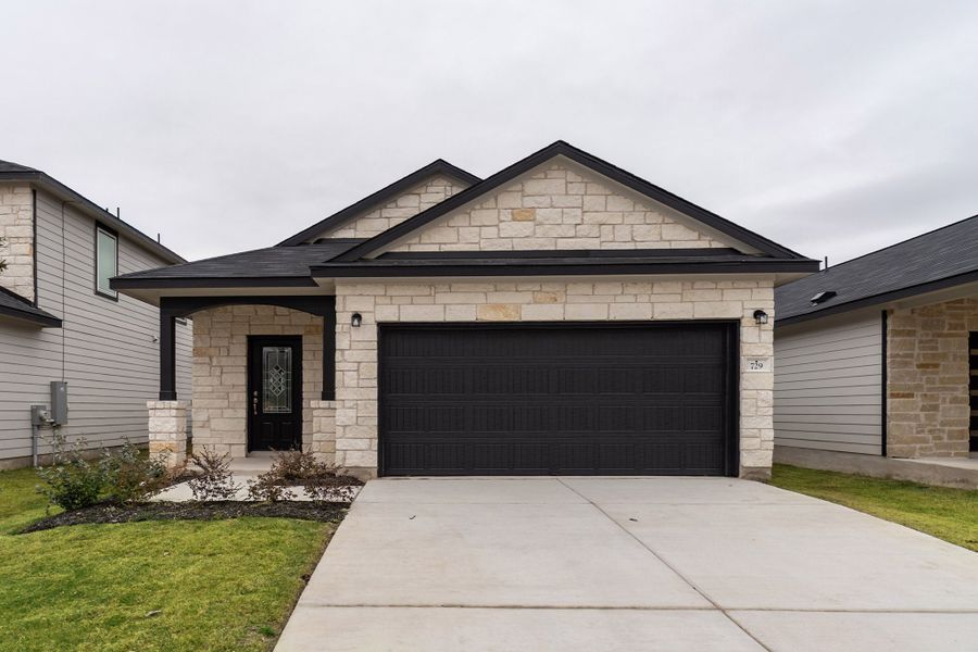 Front exterior of a new home in Cool Water, Jarrell, TX, highlighting curb appeal (Image 1). Front exterior of a new home in Cool Water, Jarrell, TX, highlighting curb appeal (Image 1).