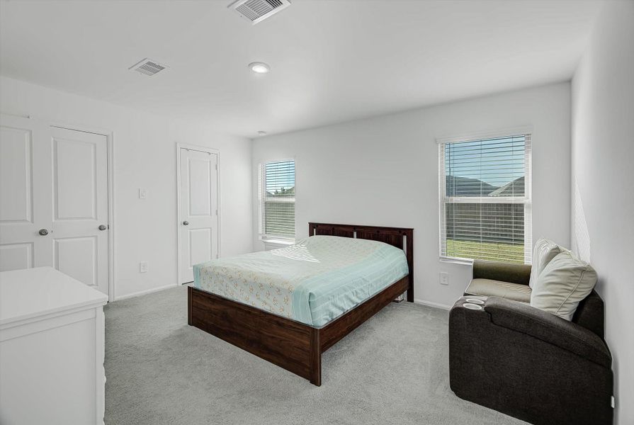 Furnished interior view inside a new home in Pinewood at Grand Texas: Colonial & Cottage Collections, New Caney (Image 26).