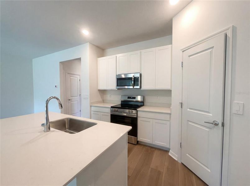 Furnished interior view inside a new home in Grand Park, Dunnellon (Image 9).
